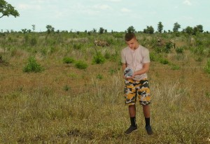 Nathan holding a baby elephant.